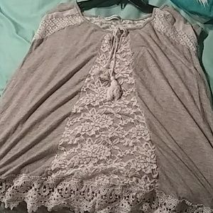 A grey lace shirt